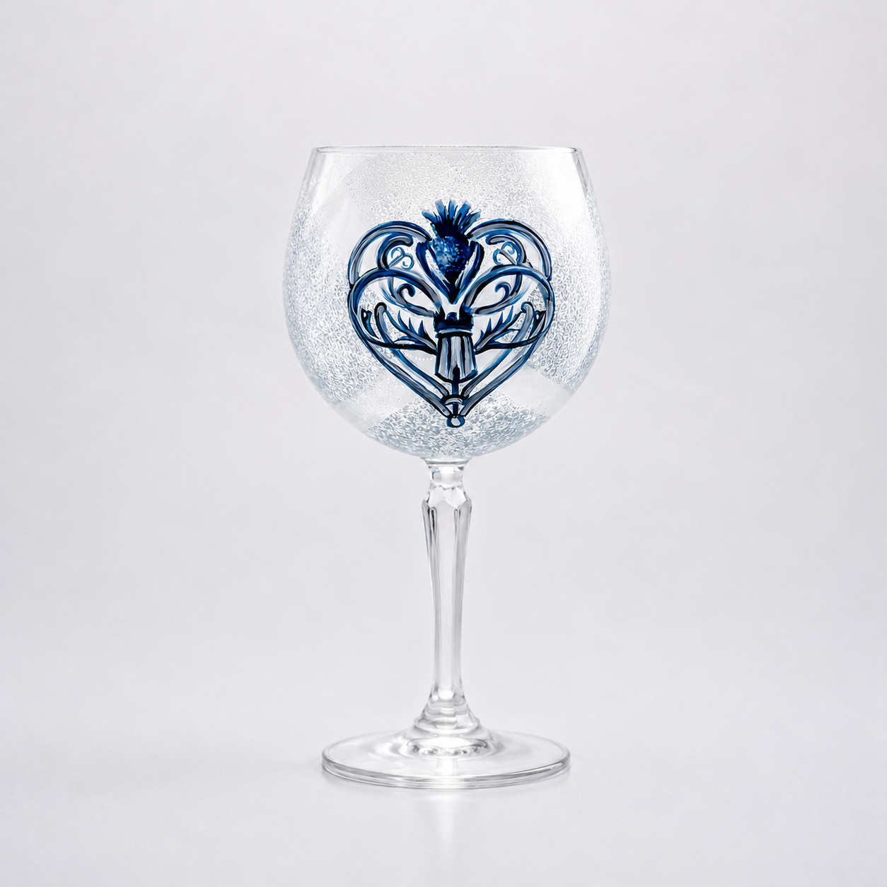 Heart of Scotland hand-painted balloon gin glass with blue thistle logo