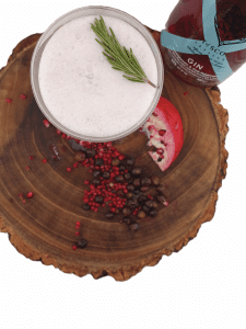 Pink Pomegranate Gin Fizz cocktail with a rich pink hue, highlighting our craftsmanship in this Scottish Craft Premium pink Gin