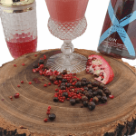 Pink Pomegranate Gin Fizz cocktail with a rich pink hue, highlighting our craftmanship in this Scottish Craft Premium pink Gin
